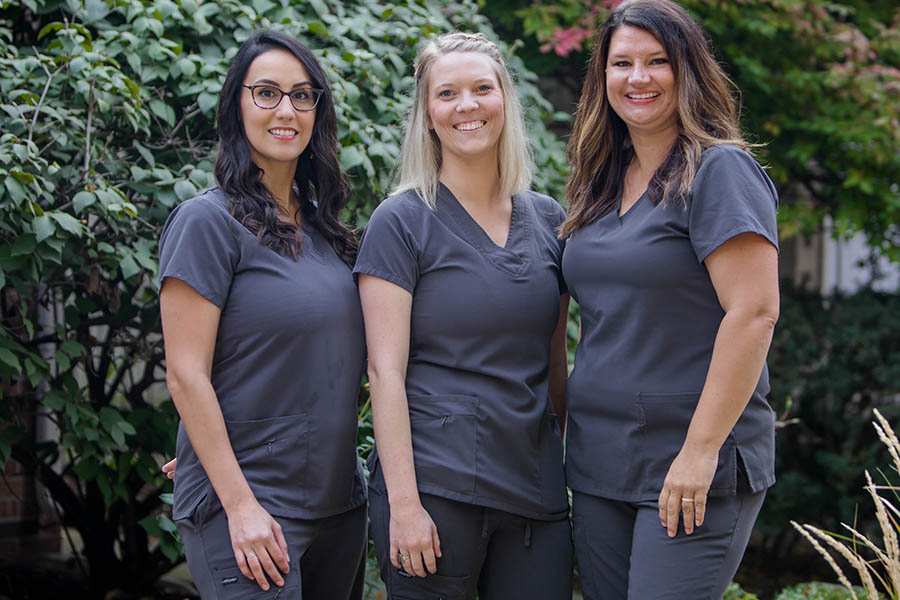 three female dental assistant